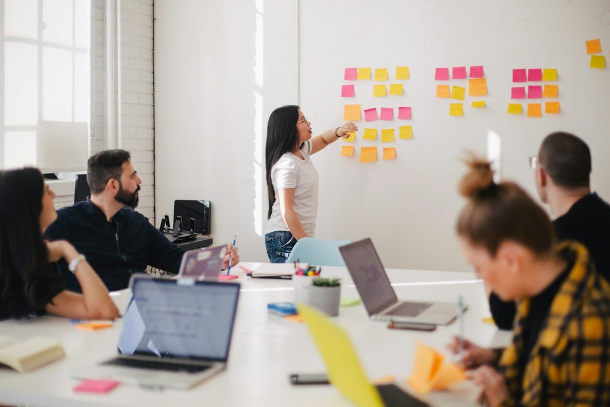 Growth team planning a campaign on a whiteboard